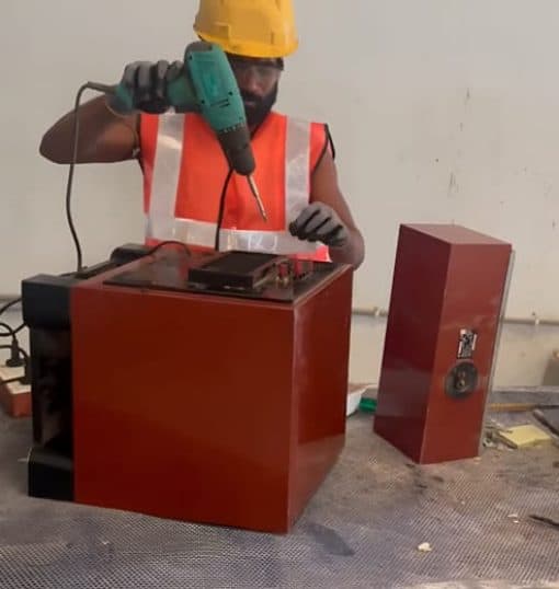 E-Waste Management - Worker Processing Electronic Waste