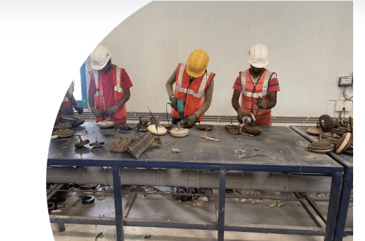 E-Waste Recycling Services - Workers Disassembling Electronics